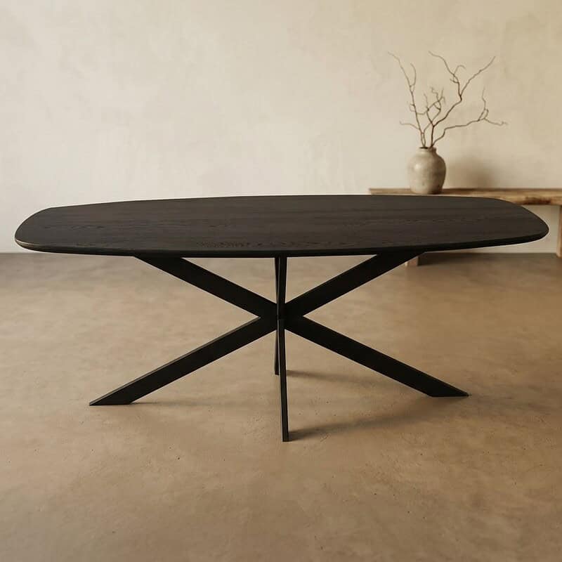 Moderne zwarte eettafel van hout met X-vormige poten, perfect voor een eigentijdse eetkamer of woonruimte. Duurzaam en stijlvol design voor elke interieurstijl.