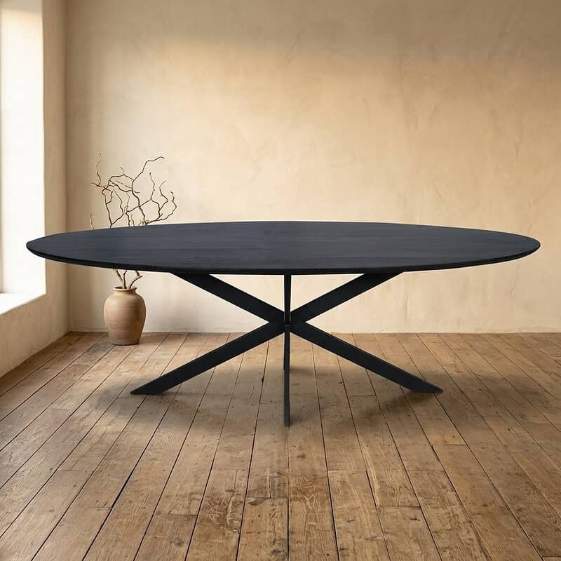 Moderne zwarte eettafel met uniek ontwerp, perfect voor stijlvolle eetkamers en interieurdecoratie.