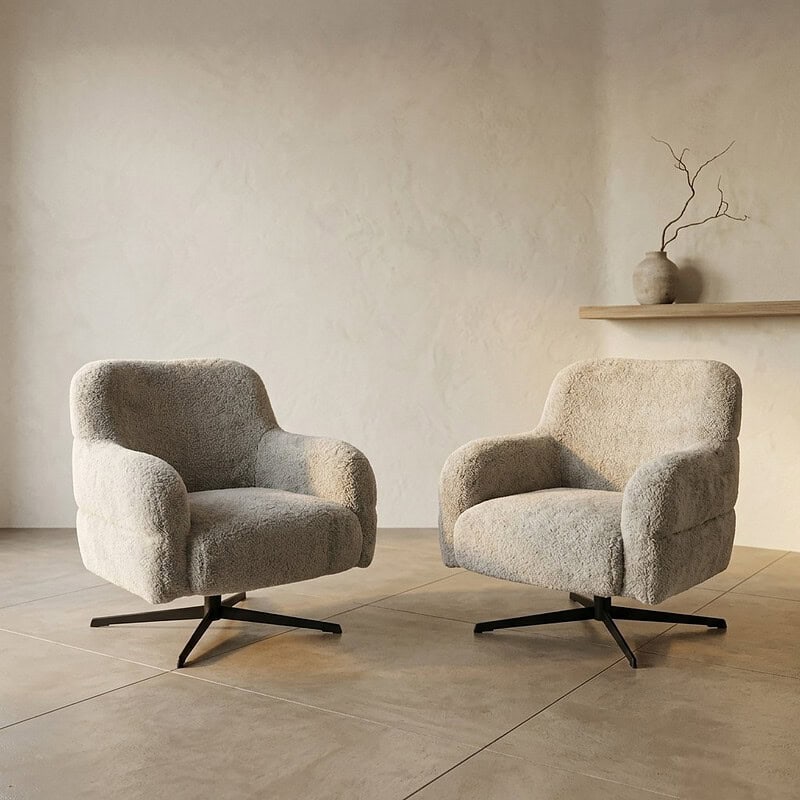 Banken met zachte, comfortabele bekleding en moderne zwarte onderstellen, ideaal voor een stijlvolle en gezellige woonkamer.
