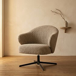 Comfortabele moderne lounge stoel met zachte bekleding en draaibaar onderstel, perfect voor een stijlvolle en gezellige zithoek.