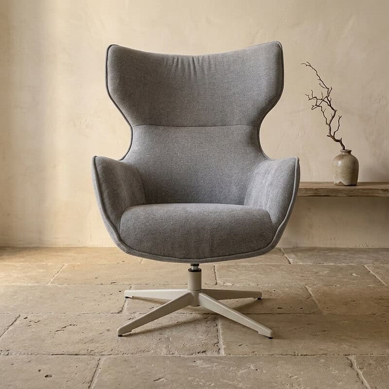 Comfortabele moderne lounge fauteuil in grijs stof met hoge rugleuning en draaibaar onderstel, perfect voor een stijlvolle woonkamer of kantoorruimte.