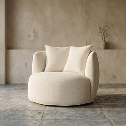 Luxuriöser weißer Sessel mit weicher Polsterung und runden Formen, perfekt für moderne und stilvolle Einrichtungen.