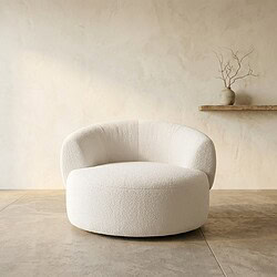 Moderne, witte Mokana zitbank met zachte bekleding en ronde vormen, perfect voor een eigentijdse woonkamer.