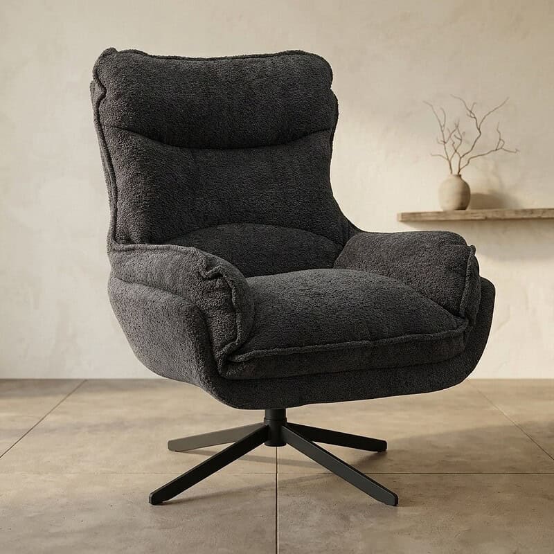 Moderne, comfortabele zwarte fauteuil van Mokana meubelen, perfect voor woonkamer of kantoor, met zachte bekleding en draaibaar onderstel.