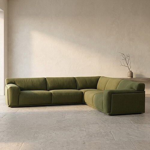 Moderne groene loungebank van Mokana meubelen, perfect voor stijlvolle woonruimtes en zithoeken.