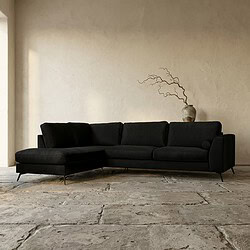 Elegante zwarte loungebank met chaise longue, perfect voor een moderne woonkamer. Gemaakt door Mokana Meubelen, combineert comfort en stijl met strakke lijnen en hoogwaardige materialen.