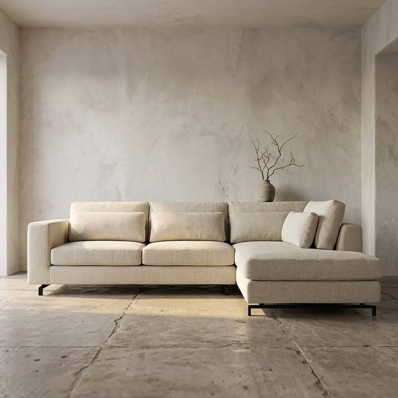 Moderne bank van Mokana Meubelen in een minimalistische woonkamer, perfect voor een stijlvolle en gezellige zithoek.