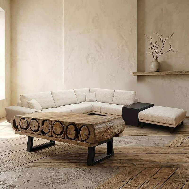 Moderne bank met houten tafel en zwart metalen poten in een minimalistische woonkamer.