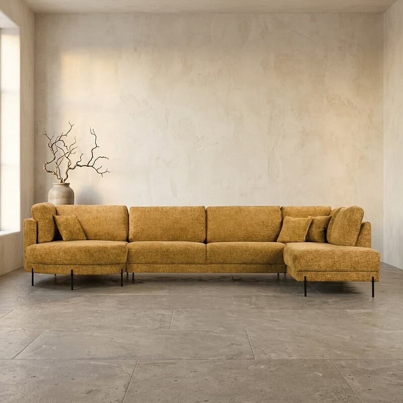 Bank met moderne, comfortabele hoekbank in een minimalistische woonkamer.