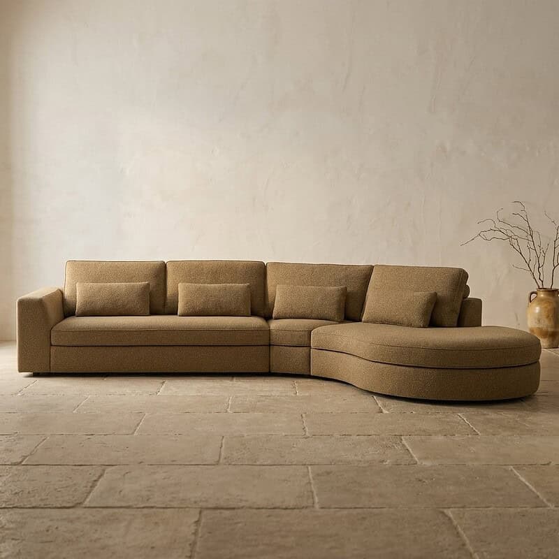 Bank met moderne, comfortabele hoekbank in een minimalistische woonkamer, perfect voor stijlvolle woonruimtes.