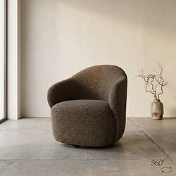 Comfortabele, moderne Mokana fauteuil in een minimalistische interieursetting met natuurlijke tinten en een rustige sfeer. Perfect voor een stijlvolle woonkamer of lounge.