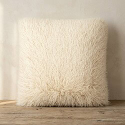 Comfortabel wollenkussen in crèmekleur, perfect voor een gezellige zithoek of relaxruimte, gemaakt van hoogwaardig, zacht en duurzaam materiaal.