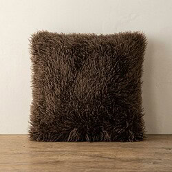 Kussen van schapenvacht, zacht en warm, ideaal voor een gezellige woonkamer of slaapkamer. Perfect voor het toevoegen van natuurlijke textuur en comfort aan je interieur.