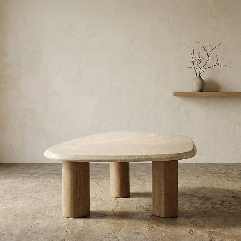 Eenvoudige houten salontafel met afgeronde hoeken in een minimalistische woonkamer, perfect voor modern interieur.