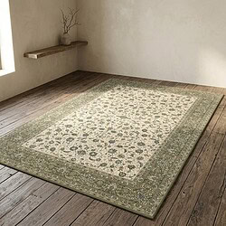 Traditioneller persischer Teppich mit Blumenmustern auf Holzboden, perfekt für elegante Wohnzimmer.