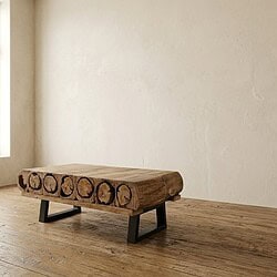 Moderne houten salontafel met natuurlijke afwerking en zwarte metalen poten, perfect voor een eigentijdse woonkamer.